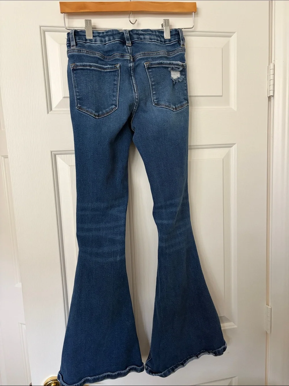 Distressed Dark Blue Flare Jeans with Ripped Detail